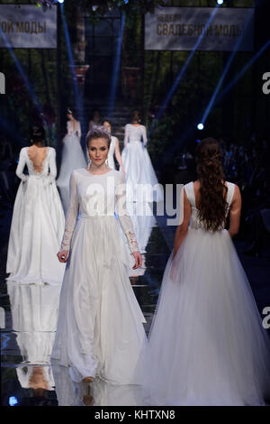 St. Petersburg, Russia - November 17, 2017: Wedding dress By Florentseva in the fashion parade of St. Petersburg Bridal Fashion Week. The event includ Stock Photo