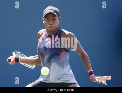 American junior tennis player CORI GAUFF (USA) playing forehand shot at US Open 2017 Tennis Championship, New York City, New York State, United States Stock Photo