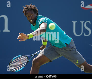 French tennis player GAEL MONFILS (FRA) plays forehand shot during men's singles match in US Open 2017 Tennis Championship, New York City, New York St Stock Photo