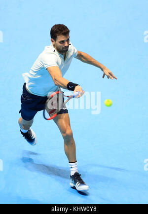 Grigor Dimitrov in action against David Goffin in the Men's Singles Final during day eight of the NITTO ATP World Tour Finals at the O2 Arena, London. PRESS ASSOCIATION Photo. Picture date: Sunday November 19, 2017. See PA story TENNIS London. Photo credit should read: Adam Davy/PA Wire. Stock Photo