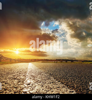 dramatic sky over asphalt road Stock Photo - Alamy