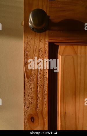 wooden interior door badly suffering from cat claw scratching Stock Photo