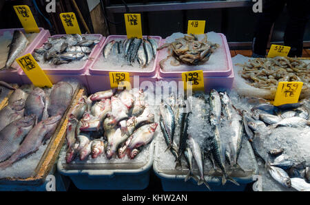 Fresh fish for sale at a street stall on Mott Street in Chinatown, New York City Stock Photo