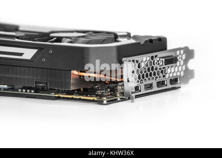 Video Graphics card with powerful GPU isolated on white background. Might be used to mine cryptocurrencies. Closeup photo with shallow depth of field. Stock Photo