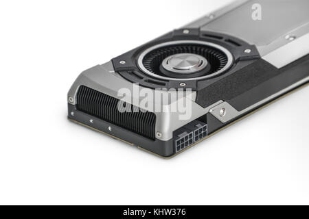 Video Graphics card with powerful GPU isolated on white background. Might be used to mine cryptocurrencies. Closeup photo with shallow depth of field. Stock Photo