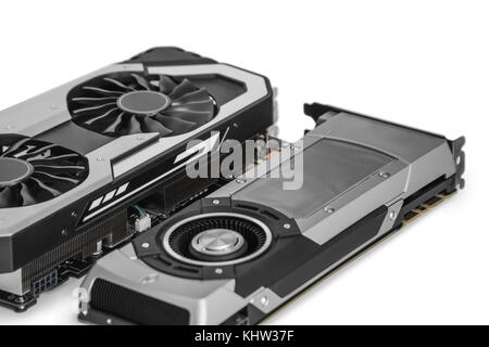 Video Graphics card with powerful GPU isolated on white background. Might be used to mine cryptocurrencies. Closeup photo with shallow depth of field. Stock Photo