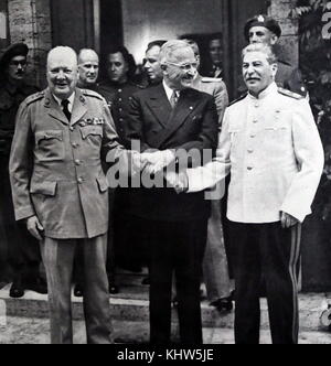 Photograph of President Harry S. Truman, Sir Winston Churchill and Joseph Stalin shaking hands during the Potsdam Conference. Sir Winston Leonard Spencer-Churchill (1874-1965) a British politician and Prime Minister of the United Kingdom. Harry S. Truman (1884-1972) the 33rd President of the United States. Joseph Stalin (1878-1953) a Soviet revolutionary, political leader, and Premier of the Soviet Union. Dated 20th Century Stock Photo