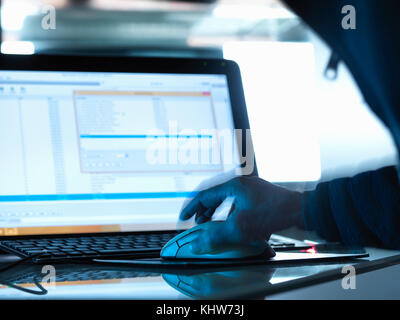 Cyber Attack, Cyber hacker accessing somebody else's computer programme Stock Photo