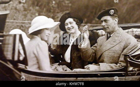 Photograph of King George VI and Queen Elizabeth Queen Mother in a carriage. George VI (1895-1952) King of the United Kingdom and the Dominions of the British Commonwealth, the last Emperor of India and the first Head of the Commonwealth. Queen Elizabeth The Queen Mother (1900-2002). Dated 20th Century Stock Photo