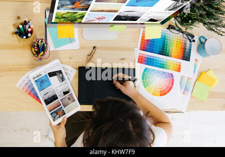 girl checking portfolio at design studio Stock Photo