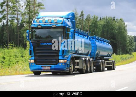 SALO, FINLAND - JULY 19, 2015: Blue Scania R500 tank truck on the road. Scania increased its market share in Europe to record high 17,2 percent during Stock Photo