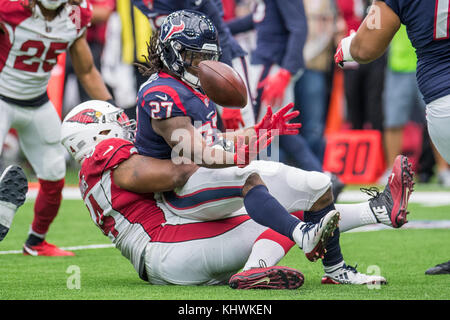 Arizona Cardinals running back Darrel Williams (24) is tackled by Carolina  Panthers defensive tackle Derrick Brown (95); safety Xavier Woods (25), and  cornerback Myles Hartsfield (38) during an NFL football game, Sunday