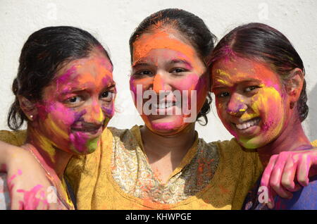 Festival of colors.  Holi.  Indianness.  India.  Colorful faces. Stock Photo