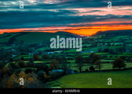 Sunset over the Vale of Clwyd with autumn trees Stock Photo