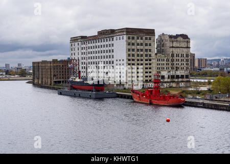 Millennium Mills buildings viewed from the Royal Victoria Dock, London England United Kingdom UK Stock Photo