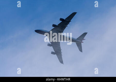 British Airways Airbus A380 in flight viewed from below Stock Photo