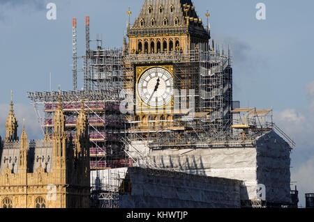 Elizabeth Tower (Big Ben) and the Palace of Westminster covered in scaffolding during maintenance work, London England United Kingdom UK Stock Photo