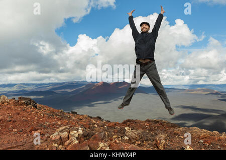 Tourist at the top of Hiking trail climb to North Breakthrough Great Tolbachik Fissure Eruption 1975 Stock Photo