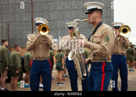 Marines with Marine Corps Band New Orleans perform traditional New Orleans songs, such as “Bourbon Street Parade,” and “St. James Infirmary” at the halfway point of a Headquarters Battalion, Marine Forces Reserve, motivational run in New Orleans, Nov. 9, 2017. HQBN, MARFORRES, sponsored the run to celebrate the Marine Corps birthday and boost morale and foster unit cohesion. (U.S. Marine Corps photo by PFC. Tessa D. Watts) Stock Photo