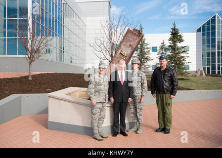 Defense Secretary Jim Mattis stands with (from left) U.S. Northern Command Senior Enlisted Leader Chief Master Sgt. Harold l. Hutchison, NORTHCOM Commander Air Force Gen. Lori Robinson and North American Aerospace Defense Command Deputy Commander Canadian Lt. Gen. Pierre St-Amand at the 9-11 memorial outside the headquarters building in Colorado Springs, Co., on Nov. 16, 2017. (DoD photo by Army Sgt. Amber I. Smith) Stock Photo