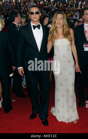 Brad Pitt and Jennifer Aniston arriving at the 56th Emmy Awards at the Shrine Auditorium in Los Angeles. September 19, 2004. PittBrad AnistonJennifer. Actor, Actress, Premiere, celebrities event, Arrival, Vertical, Film Industry, Celebrities, Bestof, Arts Culture and Entertainment, Topix Stock Photo