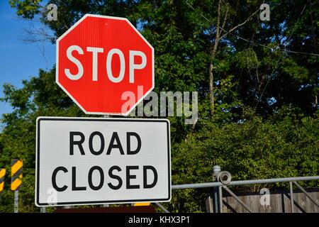 Road closed sign on the street. Stock Photo