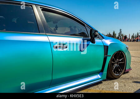 Teal vehicle in a parking lot with day lighting. Custom cars in Southern California summer 2017 Stock Photo