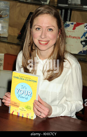 NEW YORK, NY - APRIL 04: Chelsea Clinton speaks on stage before signing copies of her new book 'It's Your World' at Housing Works Bookstore on April 4, 2017 in New York City   People:  Chelsea Clinton Stock Photo