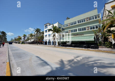 MIAMI BEACH,  FL - SEPTEMBER 12: (EXCLUSIVE COVERAGE) Residents waited hours to get over the causeway to return to South Beach after a mandatory evacuation only to find the Effects of Extreme Category 5 Hurricane Irma. The beach, Ocean Drive, Collins Ave, Miami Marina and  even the Miami Port which are always packed with people, boats and cruise ships were all empty and had almost an erie dead calm to it as millatary black hawk helicopters patrolled the beaches as residents returned to their home's and business on September 12, 2017 in Miami Beach, Florida   People:  Pellican Ocean Drive Stock Photo