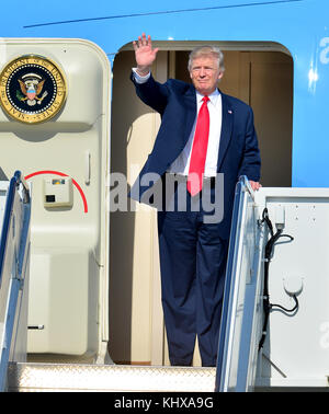 WEST PALM BEACH, FL - FEBRUARY 17: U.S President Donald Trump waves after arriving on Air Force One at the Palm Beach International Airport to spend part of the weekend at Mar-a-Lago resort on February 17, 2017 in West Palm Beach, Florida. President Trump is scheduled to have a campaign rally in Melbourne, FL tomorrow.  People:  President Donald Trump Stock Photo