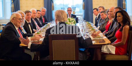 WASHINGTON, DC - SEPTEMBER 25:  President Donald J. Trump hosts a dinner Monday evening, September 25, 2017, in the Blue Room at the White House in Washington, D.C., with grassroots leaders, Penny Nance, CEO of Concerned Women for America; Tim Phillips, president of the Americans for Prosperity;  Matt Schlapp, chairman of the American Conservative Union; Leonard Leo, executive vice president of the The Federalist Society; Ralph Reed, chairman of the Faith & Freedom Coalition; Marjorie Dannenfelser, President of the Susan B. Anthony List; Ed Feulner, Founder and Acting President of The Heritage Stock Photo