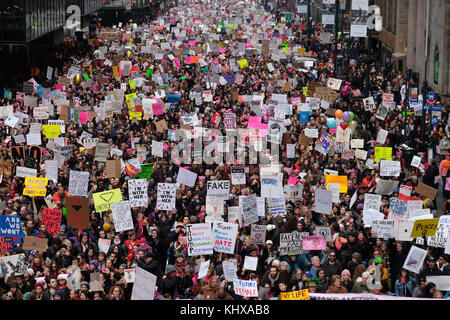 NEW YORK, NY - JANUARY 21: Protestors take part in an anti-Trump 'Women's March' in Midtown Manhattan on January 21, 2017 in New York City  People:  Protestors Stock Photo