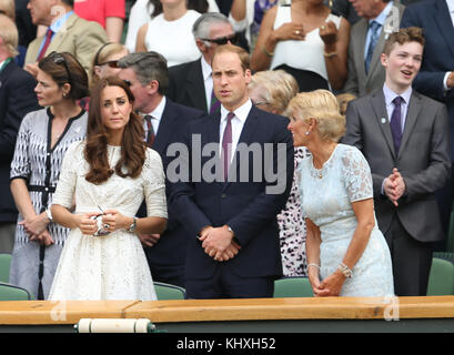 LONDON, ENGLAND - JULY 02: Catherine, Duchess of Cambridge and Prince William, Duke of Cambridge attend the Andy Murray vs Grigor Dimitrov match on centre court during day nine of the Wimbledon Championships at Wimbledon on July 2, 2014 in London, England   People:  Kate Middleton Prince William Stock Photo