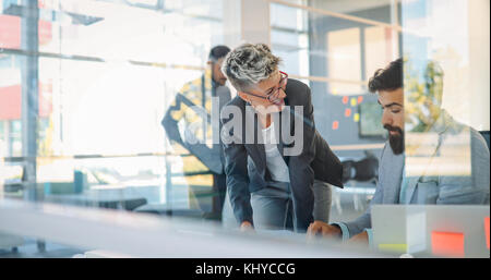 Business colleagues in conference room Stock Photo