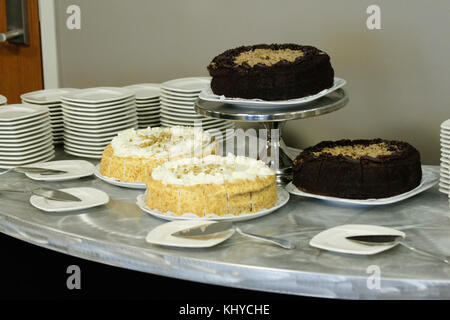 A selection of assorted cakes displayed in a variety of flavors and styles, showcasing different types of desserts for various occasions. Stock Photo