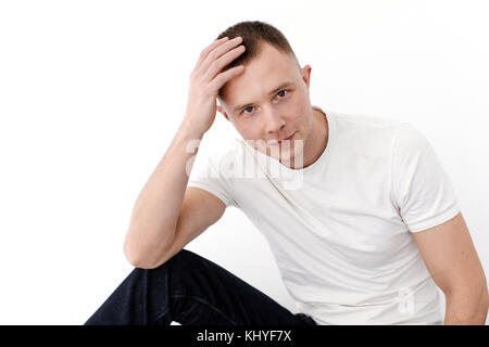 Young casual man posing at camera Stock Photo