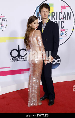 Ansel Elgort and his girlfriend Violetta Komyshan attend the 2017 American Music Awards at Microsoft Theater on November 19, 2017 in Los Angeles, California. | Verwendung weltweit Stock Photo