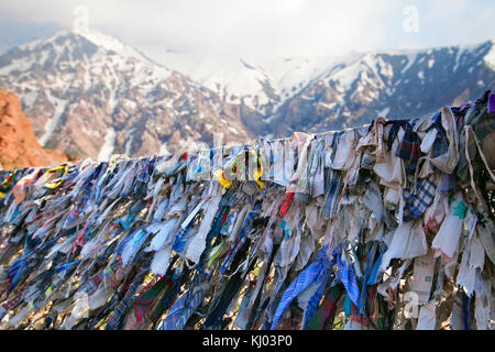 Buddhist prayer ribbons Stock Photo - Alamy