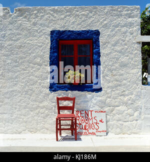 Whitewashed houses with blue windows..simply Greece Stock Photo