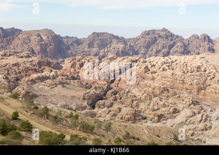 Surroundings of Petra with the Dam and the entrance of the Siq in the foreground, Jordan Stock Photo