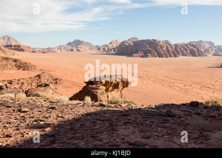 Reddish sand and rock landscapes in the desert of Wadi Rum, southern Jordan Stock Photo