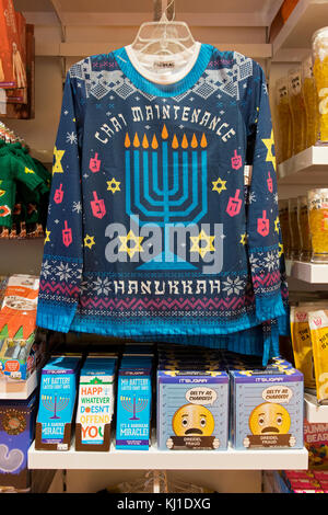 A Chnaukkah tee shirt and Chanukkah candies for sale at It'sugar at the Tanger Outlet Mall in Deer Park, Long Island, New York. Stock Photo