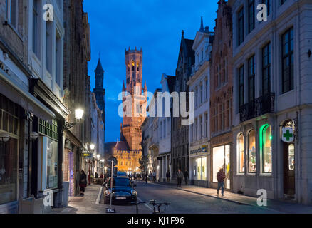 Vlamingstraat looking towards the Belfry of Bruges (Belfort van Brugge) in the Market Square (Markt), Bruges (Brugge), Belgium Stock Photo
