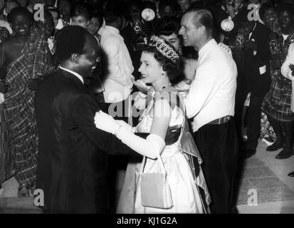 Queen Elizabeth II of Great Britain dances with President Kwame Nkrumah of Ghana, during her visit to Accra, Ghana, in 1961 Stock Photo