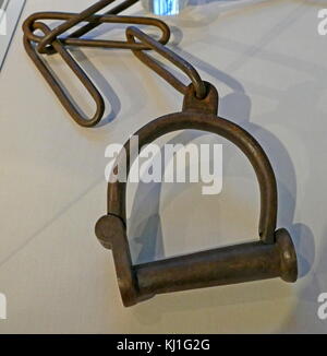 Leg Shackles and Chain were used to restrict the movement of criminals in 19th Century Dorchester Prison. The Tolpuddle Martyrs were six Dorset farm workers famously transported as convicts from Dorchester prison to Australia in 1834. They may well have worn shackles such as these. Stock Photo