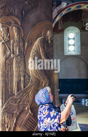 Tourist in Saint Jovan Vladimir Orthodox temple in Bar coastal town in southern Montenegro Stock Photo