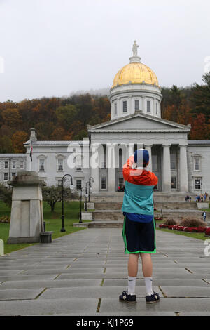 Boy taking picture of Vermont State House, Montpelier, VT, USA Stock Photo