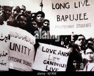 students protest in support of a hunger strike by Mohandas Karamchand Gandhi (1869 – 1948), Gandhi was the preeminent leader of the Indian independence movement in British-ruled India. At 5:17 pm on 30 January 1948, Gandhi was with his grandnieces in the garden of the former Birla House (now Gandhi Smriti), on his way to address a prayer meeting, when Nathuram Godse fired three bullets from a Beretta 9 mm pistol into his chest at point-blank range Stock Photo