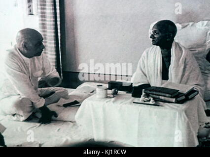 Sardar Patel with Mahatma Gandhi during his hunger strike, following Indian Partition 1947. Mohandas Karamchand Gandhi (1869 – 1948), Gandhi was the preeminent leader of the Indian independence movement in British-ruled India. At 5:17 pm on 30 January 1948, Stock Photo