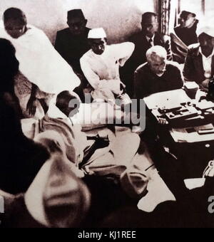 Mualana Azad with Mahatma Gandhi during his hunger strike, following Indian Partition 1947. Mohandas Karamchand Gandhi (1869 – 1948), Gandhi was the preeminent leader of the Indian independence movement in British-ruled India. At 5:17 pm on 30 January 1948, Stock Photo